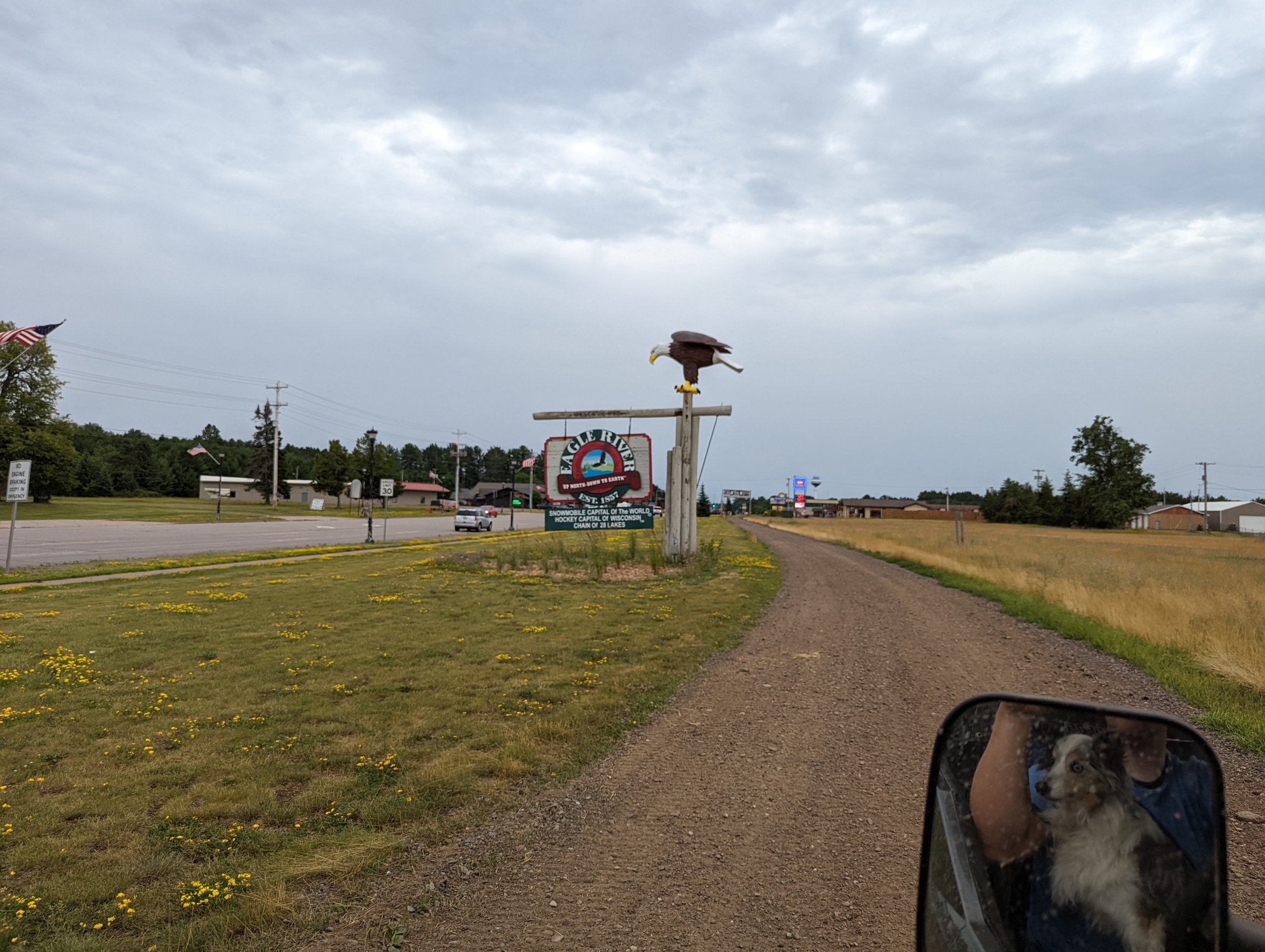 Trying to figure out if that eagle on the sign is coming to get him! LOL!